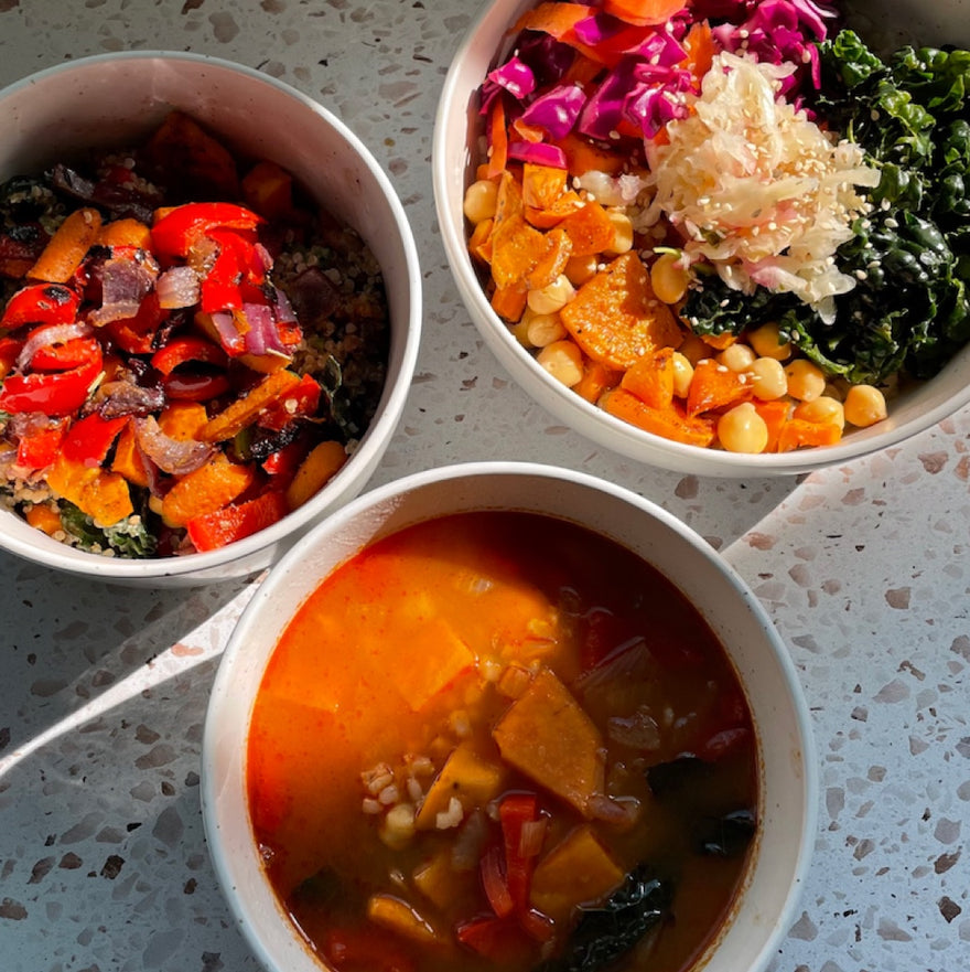 gut friendly work lunch meal prep three bowls of food on a table 