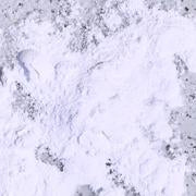 white powder on purple speckled background