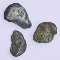 zinc pebbles on purple background