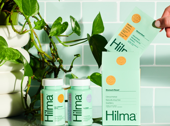 3 Digestive Products on green tile background with plant - Occasional Heartburn + Indigestion Relief, Gas + Bloat Relief, Stomach Recover + Hydrate