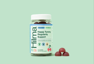 Jar of Hilma Kids Happy Tummy Regularity Support on a light green background with 3 gummies 